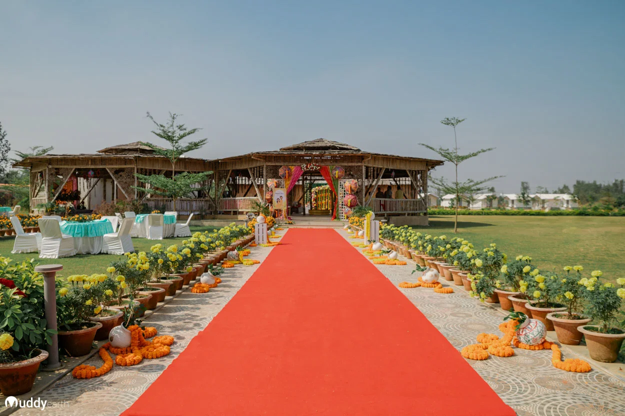 Bollywood destination wedding photo with grand mandap decor.