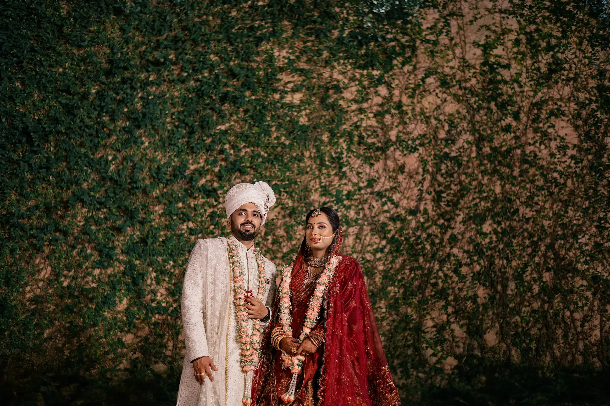 Bride and groom’s traditional portrait in wedding attire